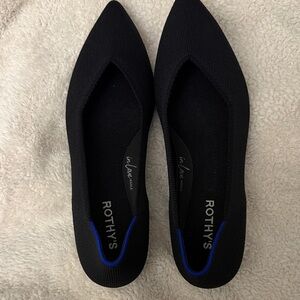 Rothy's Elegant Black Flats with Blue Trim